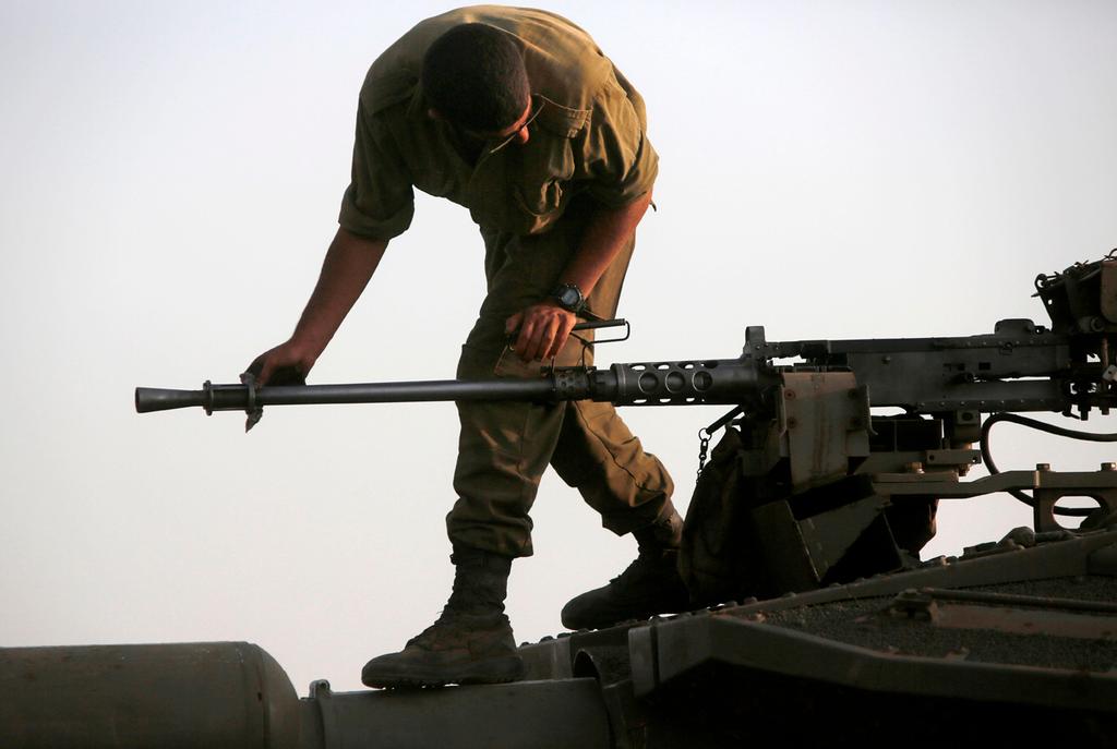 צילום: AFP תגבור כוחות צה"ל ברמת הגולן