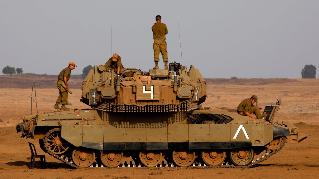 צילום: AFP תגבור כוחות צה"ל ברמת הגולן