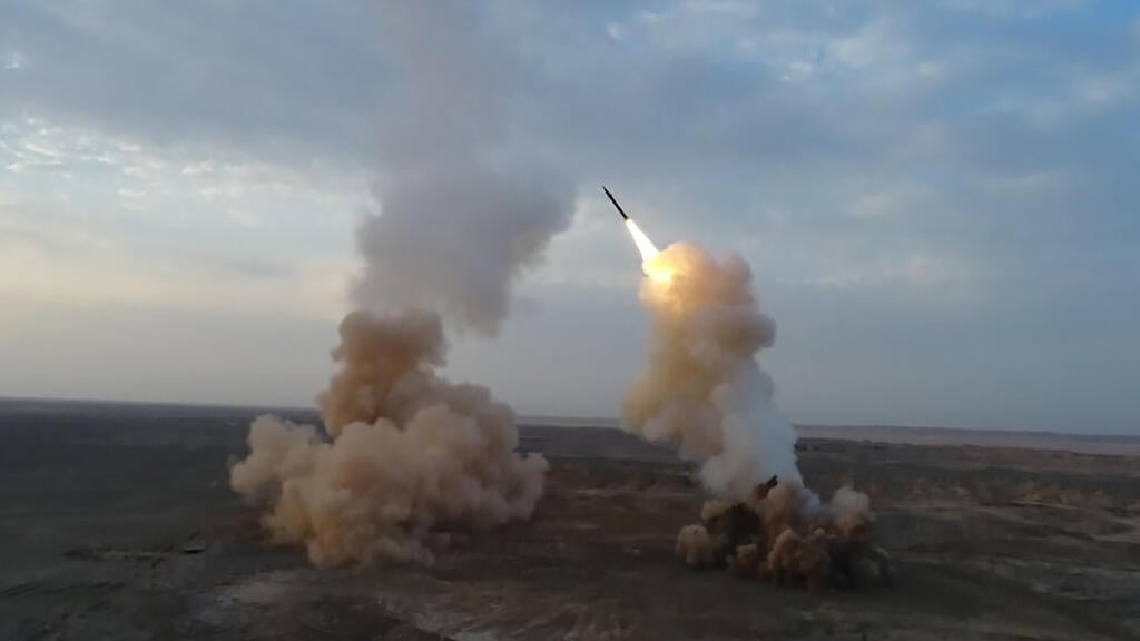 IRGC rocket launch test (Photo: AFP) איראן משמרות המהפכה שיגור טילים בליסטיים מבטן האדמה תרגיל צבאי