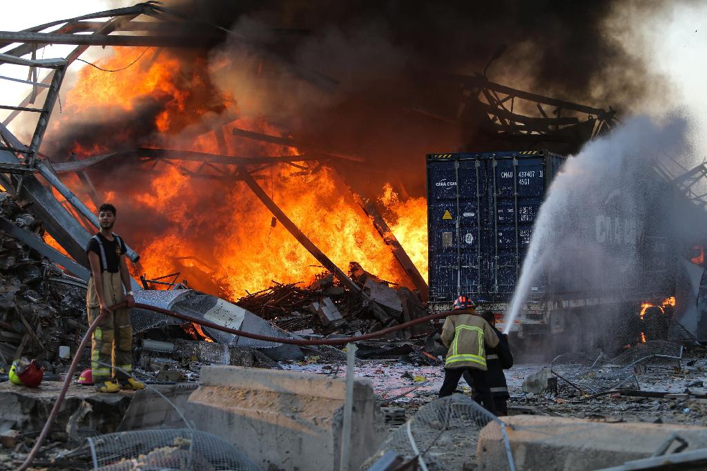 Firefighting teams try to extinguish fires after Beirut explosion 