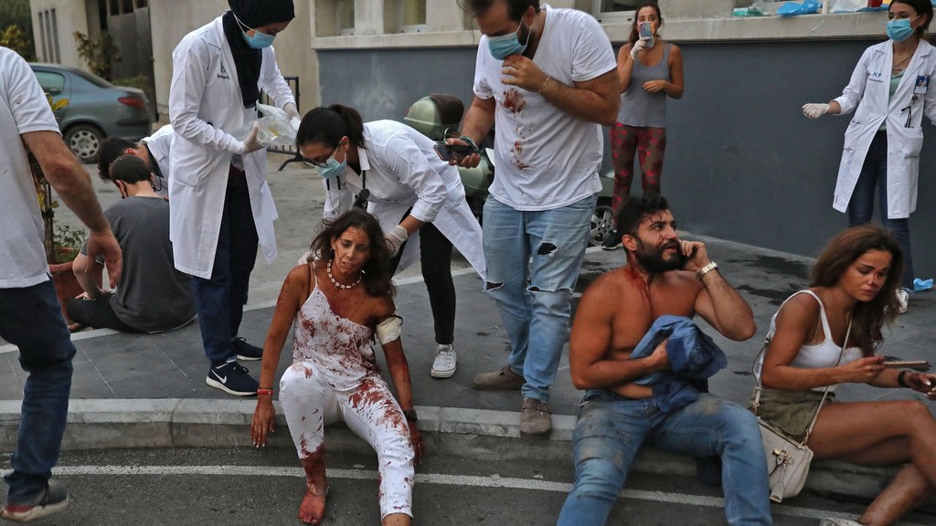 Some of the injured from a massive explosion that rocked the city of Beirut receiving medical treatment 
