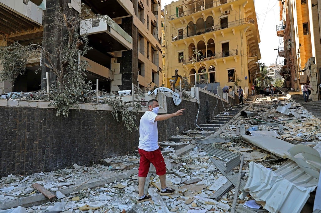 A damaged building is pictured in the aftermath of yesterday's blast