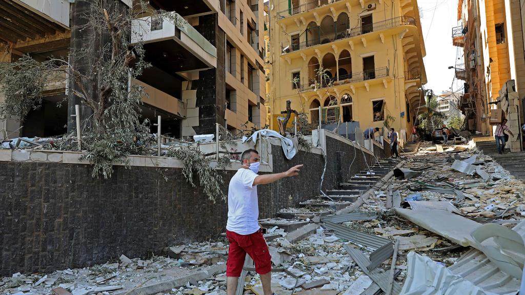 A damaged building is pictured in the aftermath of yesterday's blast