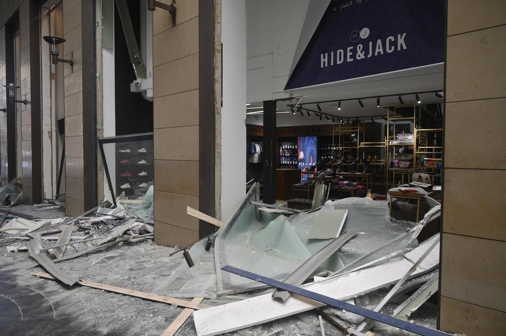 Shattered glass outside shops at Beirut Souks in the aftermath of a massive explosion in Beirut, Lebanon