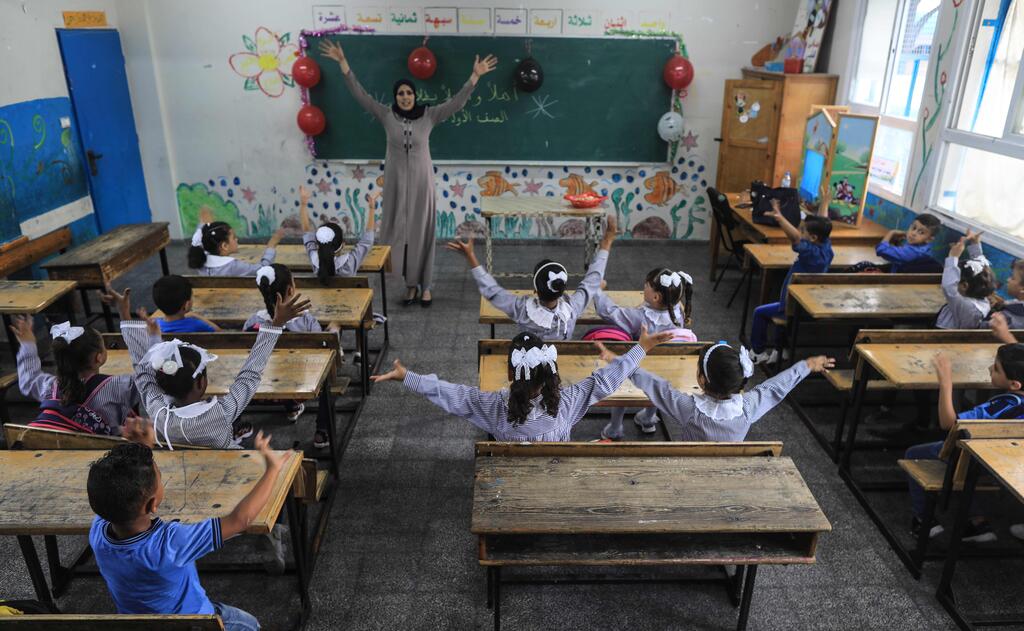 Palestinian students attend a class at a school run by The United Nations Relief and Works Agency (UNRWA) in Jabalia refugee camp in northern Gaza Strip 