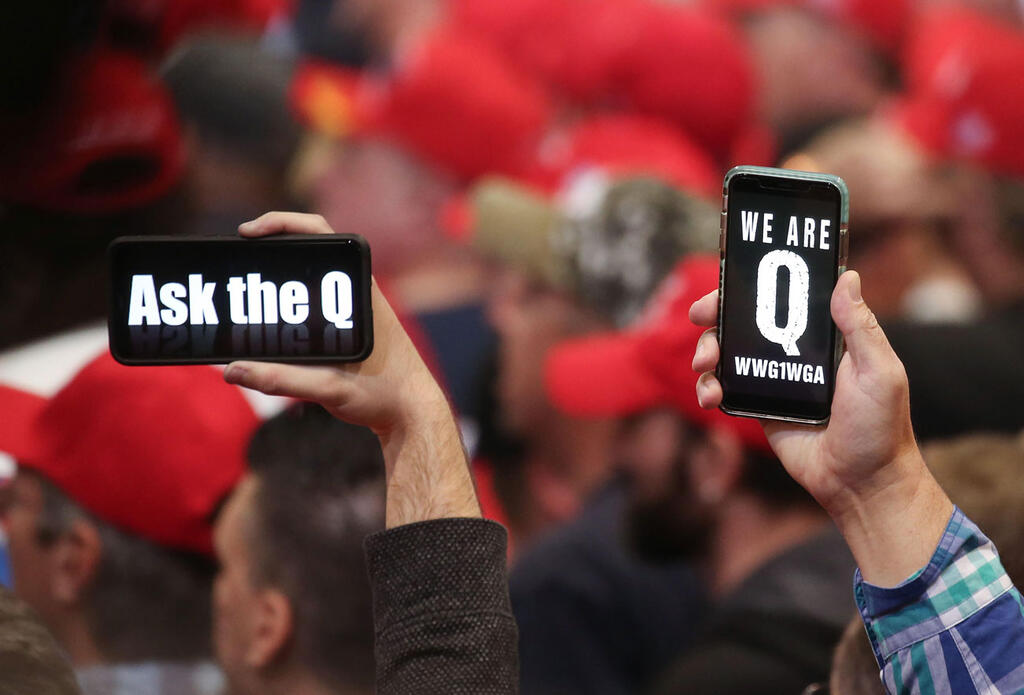 QAnon supporters (Photo: AFP) ארה"ב בחירות תומכת QAnon מרג'ורי טיילור גרין בדרך ל קונגרס