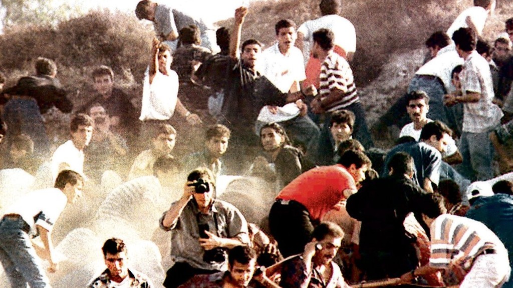 Palestinians rioters protesting the opening of the Western Wall Tunnel in the Old City of Jerusalem in 1996 