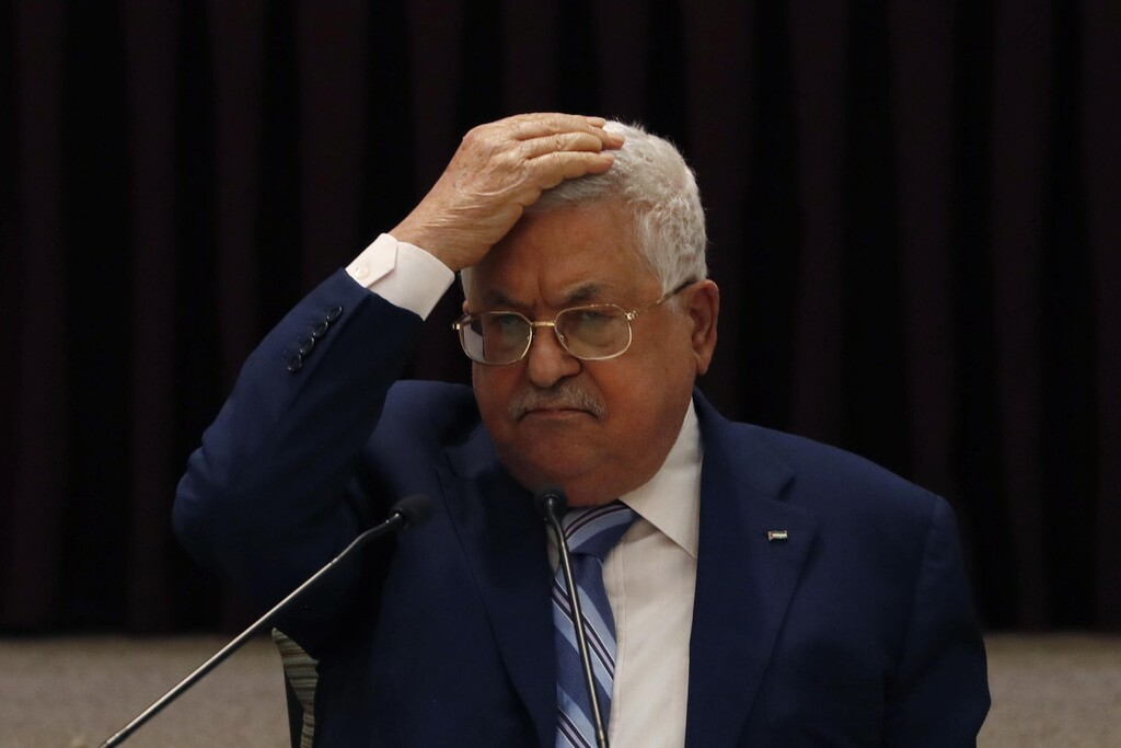 President Mahmoud Abbas gestures during a meeting with the Palestinian leadership
