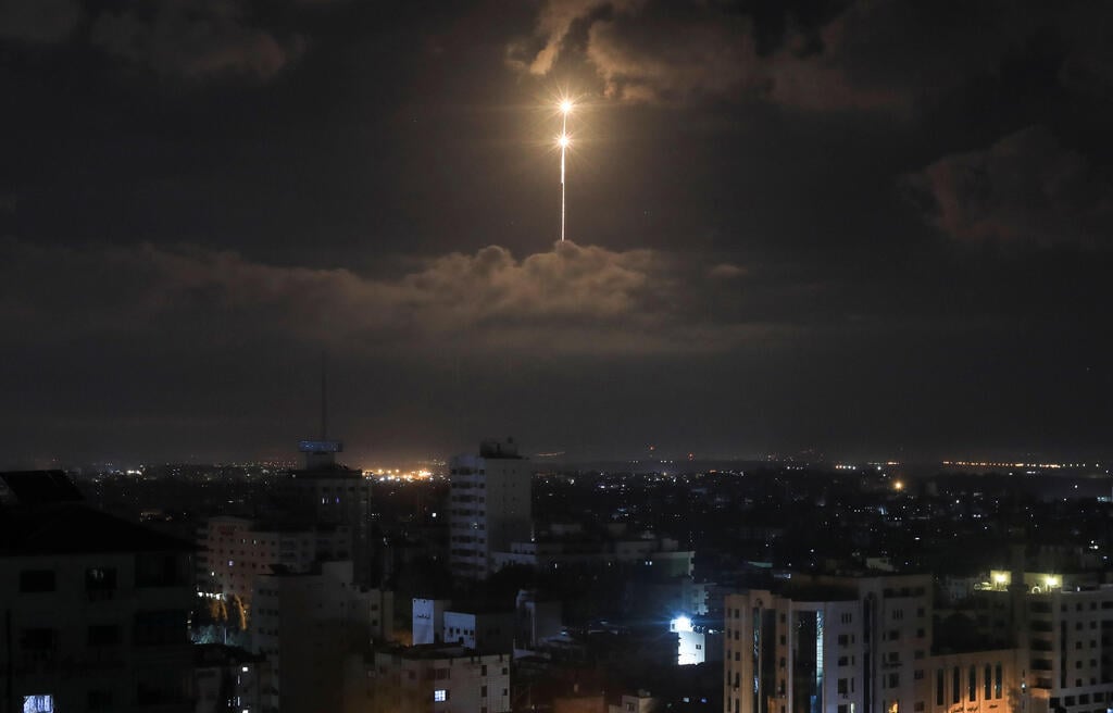 Iron Dome missile defense system intercepts rocket fired from the Gaza Strip (Photo: AFP) יירוט של כיפת ברזל