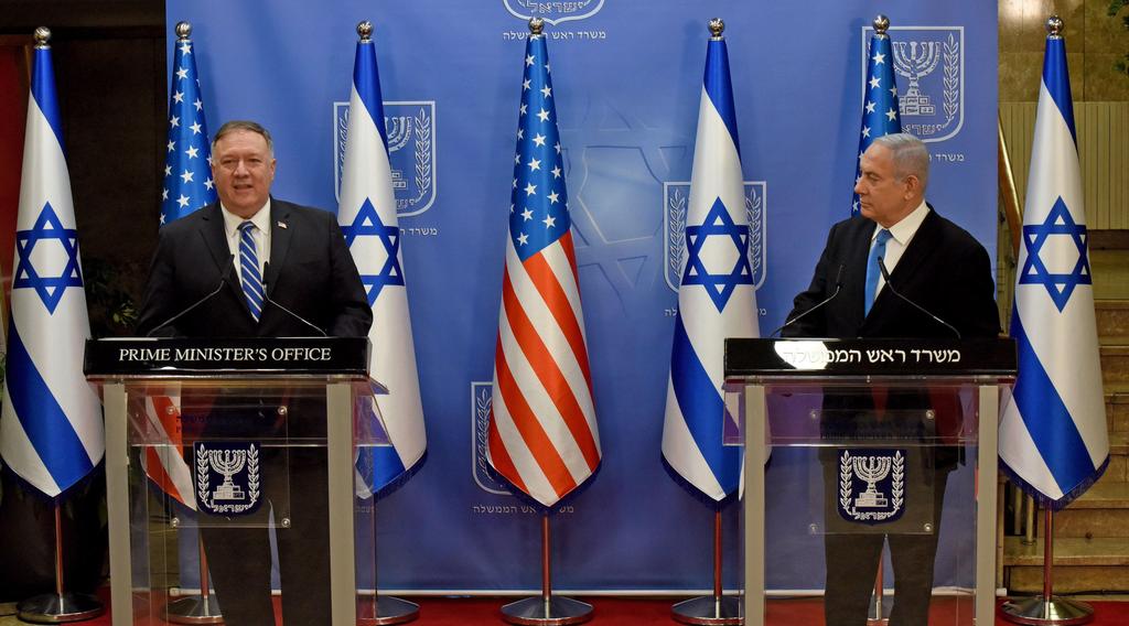 US Secretary of State Mike Pompeo (L) and Israeli Prime Minister Benjamin Netanyahu make a joint statement to the press after meeting in Jerusalem
