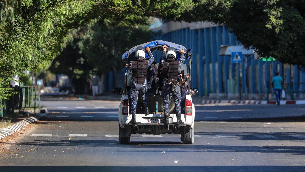 Hamas security officials patrol empty streets in Gaza during the coronavirus pandemic (Photo: EPA) Palestinian Hamas policemen patrol on empty streets amid the ongoing coronavirus COVID-19 pandemic in Gaza