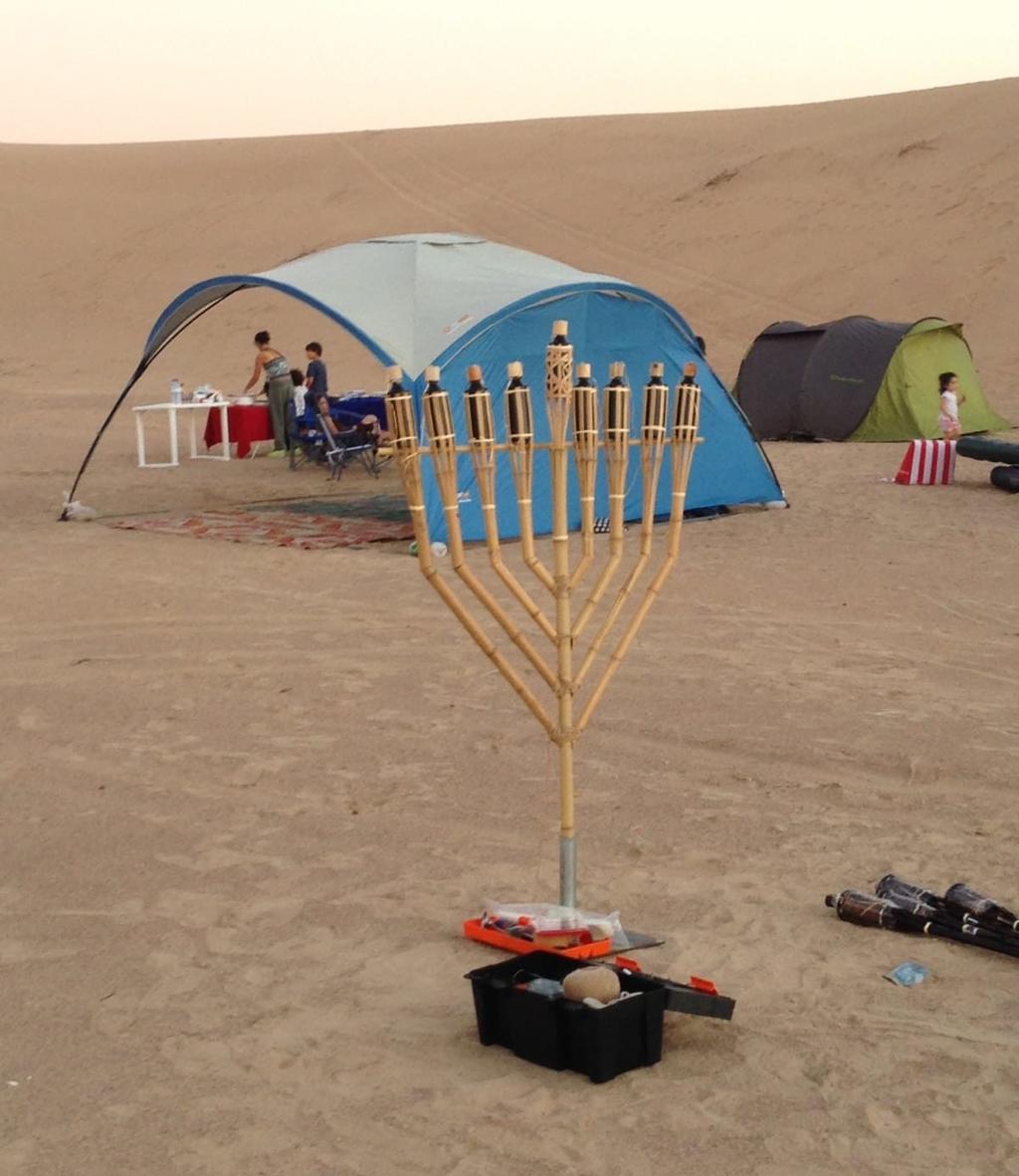 Celebrating Hanukkah in the Emirati desert. (Photo: Courtesy) Celebrating Hanukkah in the Emirati desert.