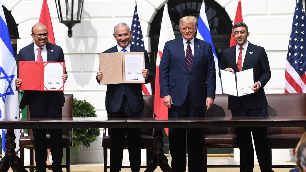 PM Benjamin Netanyahu and U.S. President Donald Trump with Bahrain's FM and the UAE's FM at the signing of the Abraham Accords at the White House (Photo: AFP) L-R: Bahrain FM Abdullatif al-Zayani, PM Benjamin Netanyahu, U.S. President Donald Trump, and Emirati FM Abdullah bin Zayed Al-Nahyan at the signing of the Abraham Accords at the White House