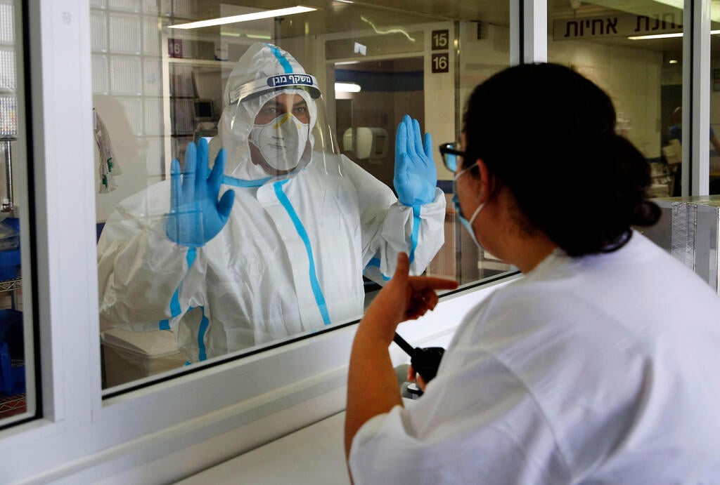Medical staff on the coronavirus ward at Barzilai Medical Center in Ashkelon 