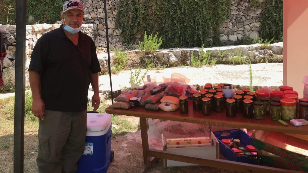 Palestinian 'peasant' Naser Rabah shows off his wares at Ramallah’s alternative souk, August 2020 (Photo: Fatina Hamad) Palestinian 'peasant' Naser Rabah shows off his wares at Ramallah’s alternative souk, August 2020