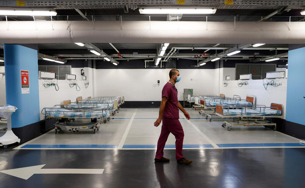 A partial view shows empty beds installed in the underground parking of Rambam Health Care Campus