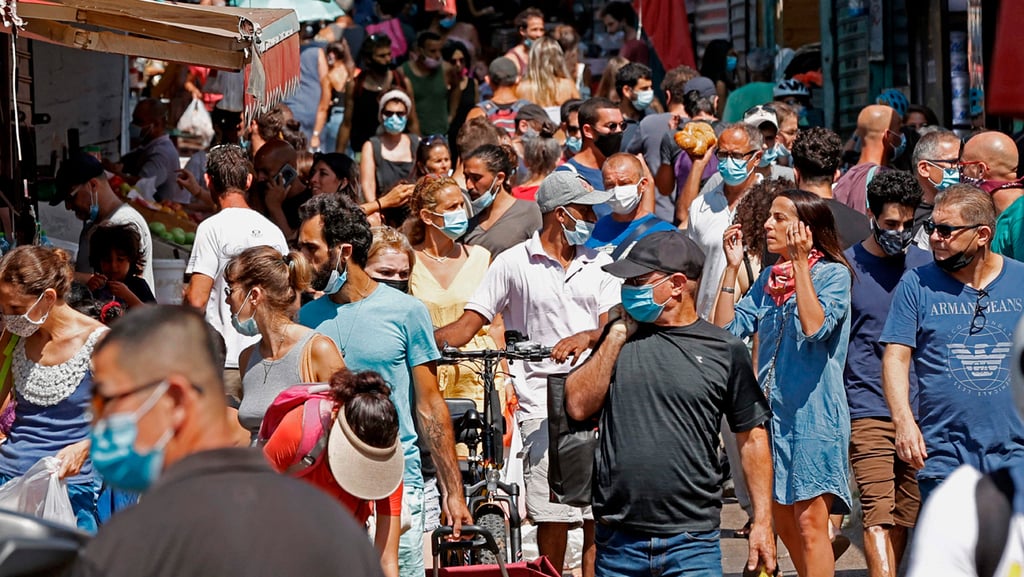 Tel Aviv's Carmel Market before the tightening of the second closure ahead of Yom Kippur (Photo: AFP) התקהלות בשוק הכרמל