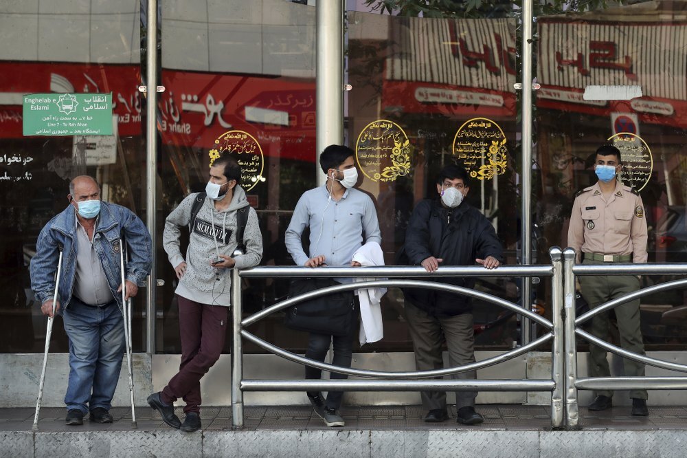 People wear protective face masks to help prevent the spread of the coronavirus in downtown Tehran (Photo: Associated Press) People wear protective face masks to help prevent the spread of the coronavirus in downtown Tehran