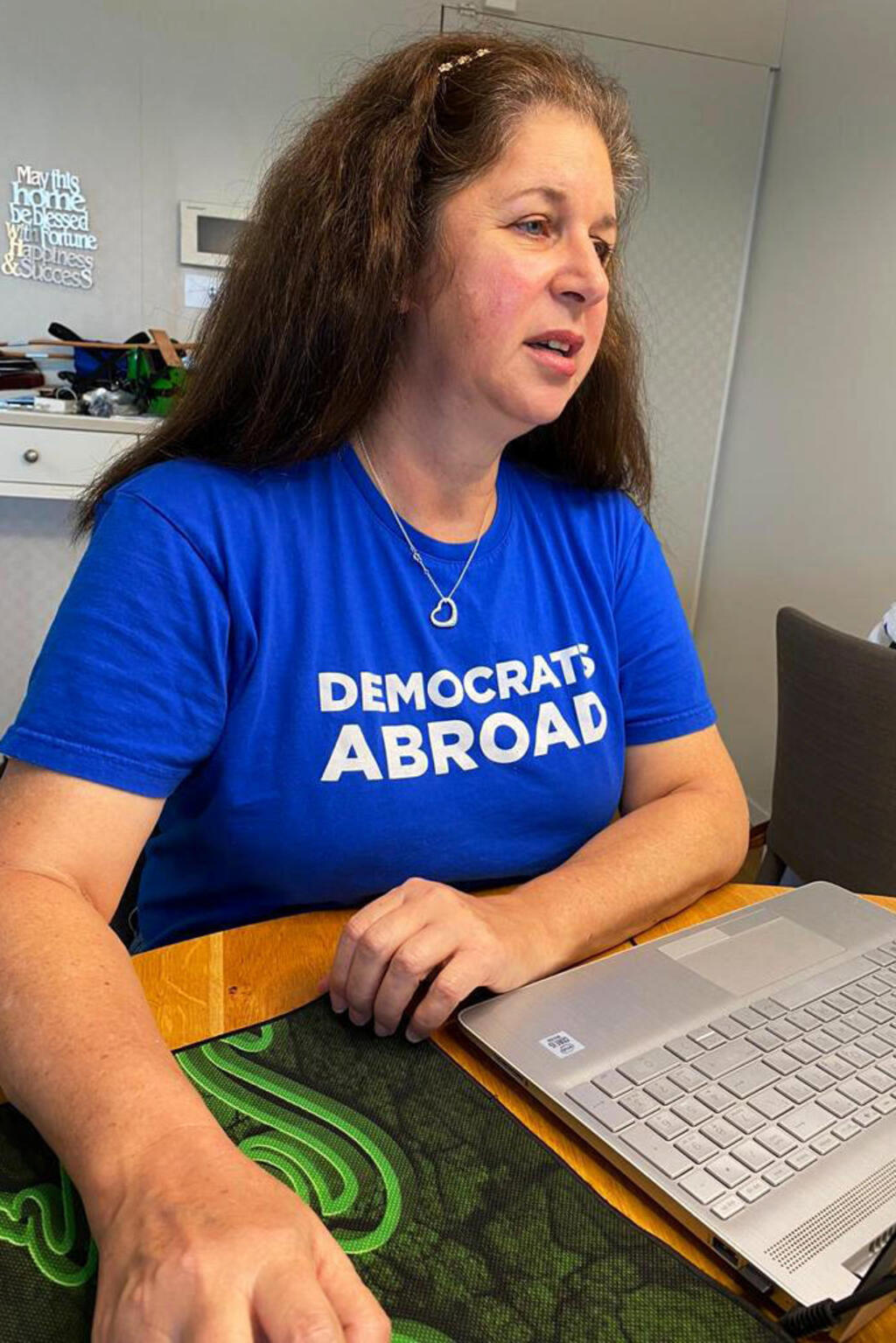 Heather Stone, chairperson of Democrats Abroad Israel, works on her computer during her interview with Reuters in Tel Aviv, Israel October 15, 2020 