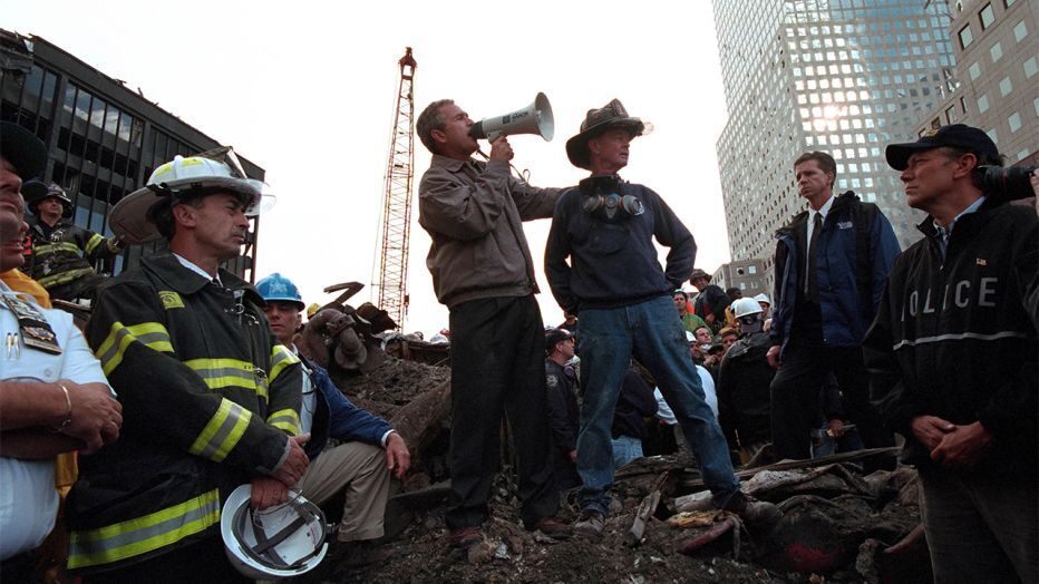U.S. President George W. Bush talks to rescue workers in the wreckage of the World Trade Center in NY after the Sept. 11, 2001 attacks 