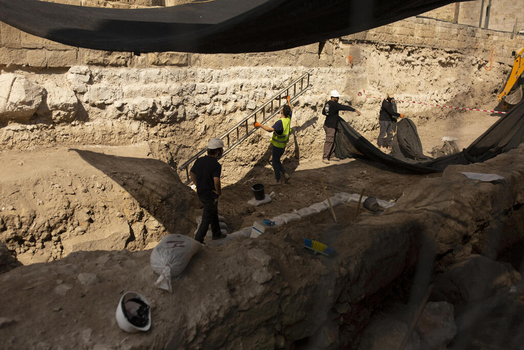 Workers excavate inside the Tower of David Museum in the Old City of Jerusalem, Oct. 28, 2020 