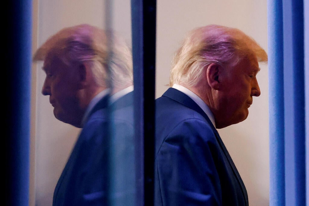 Outgoing-U.S. President Donald Trump (Photo: Reuters) U.S. President Donald Trump is reflected as he departs after speaking about the 2020 U.S. presidential election results in the Brady Press Briefing Room at the White House in Washington