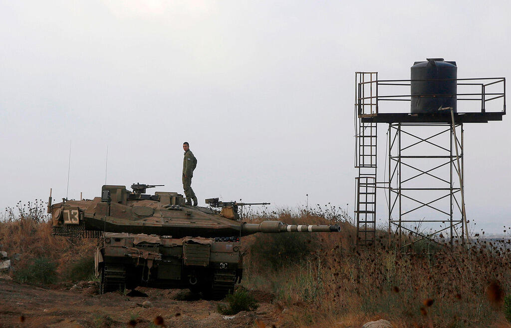 An Israeli tank near the Syrian border on the Golan Heights 