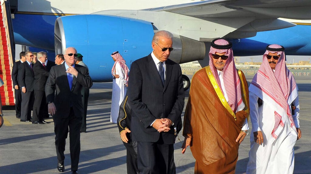 Then-Saudi foreign minister Prince Saud al-Faisal (second right) welcomes then-U.S. vice president Joe Biden to Riyadh, October 2011 