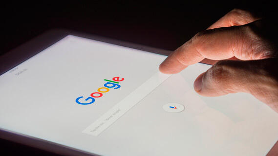 Google (Photo: Shutterstock) A person conducting a search on Google