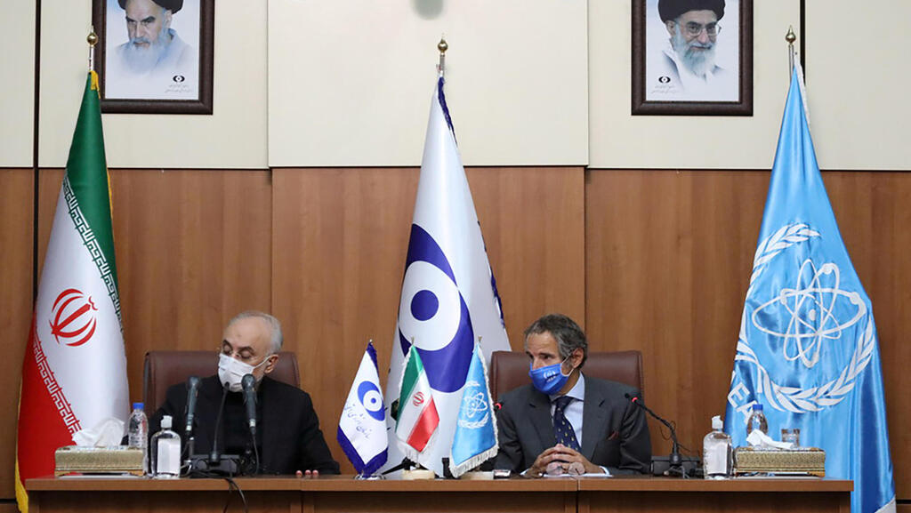  Head of Iran's Atomic Energy Organization Ali-Akbar Salehi and International Atomic Energy Agency (IAEA) Director General Rafael Grossi