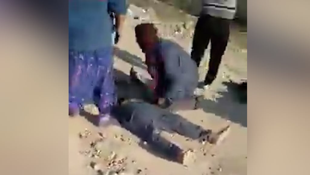 Harun Abu ‘Aram lies on the ground after he was shot by IDF troops demolishing his home ירי לעבר פלסטיני במהלך עימותים עם צה"ל בדרום חברון
