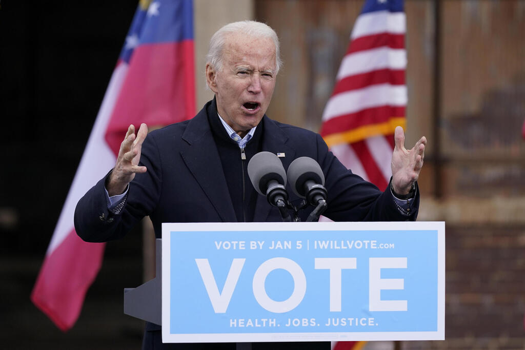  President-elect Joe Biden speaks at a drive-in rally for Georgia