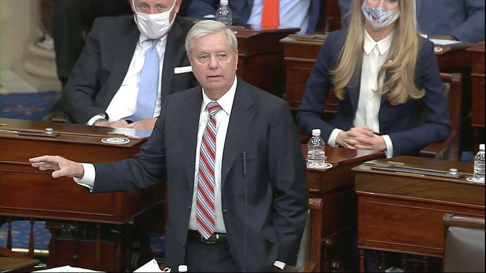 Sen. Lindsey Graham, R-S.C., speaks as the Senate reconvenes to debate the objection to confirm the Electoral College Vote from Arizona, after protesters stormed into the U.S. Capitol 