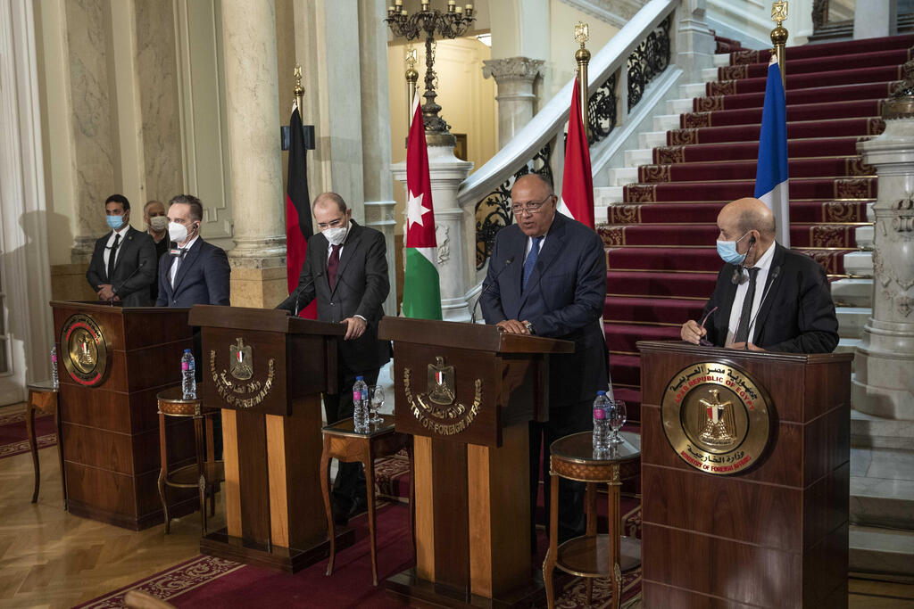 From left to right, German Foreign Minister Heiko Maas, Jordanian Foreign Minister Ayman Safadi, Egyptian Foreign Minister Sameh Shoukry, and French Foreign Minister Jean-Yves Le Drian, hold a press conference at Tahrir Palace, in Cairo, Egypt 