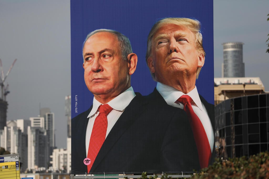 A Likud campaign poster touting party leader Benjamin Netanyahu's close ties to Donald Trump (Photo: EPA) שלט חוצות קמפיין בחירות