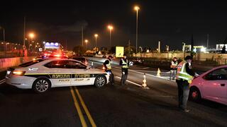 אכיפת המשטרה את הסגר השלישי במחסום במחלף קוממיות