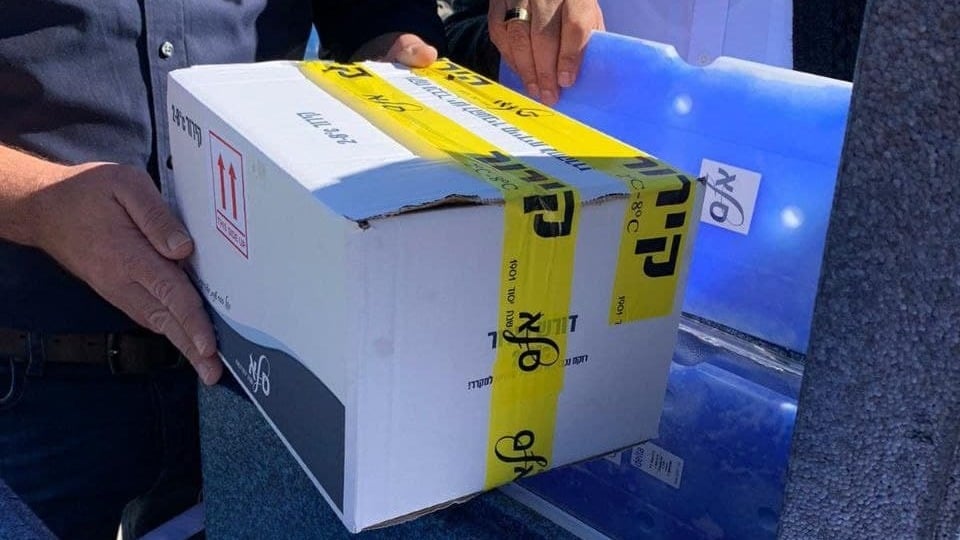 A box of Moderna's coronavirus vaccine transferred to the PA חיסון חיסונים הרשות הפלסטינים