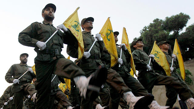 Hezbollah fighters marching in Lebanon 