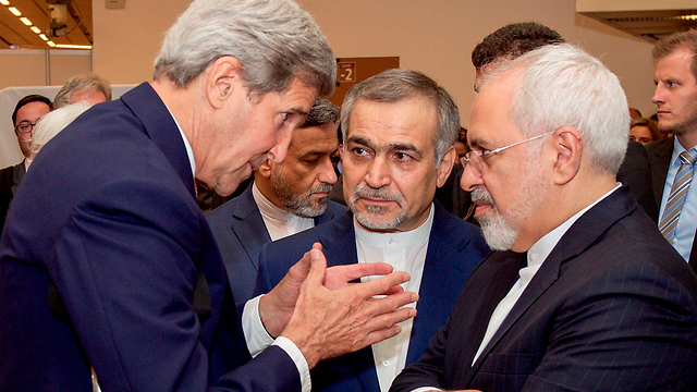 Then U.S. Secretary of State John Kerry meeting with his Iranian counterpart Mohammad Javad Zarif in 2015 