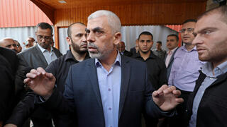 Gaza's Hamas Chief Yehya Al-Sinwar talks to media, in Gaza City 