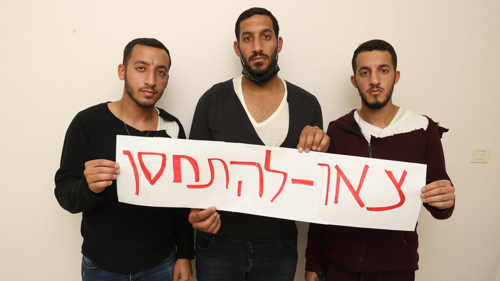 "תצילו את חייכם". לירן, שרון ולידור, בניו של חיים בנימין (צילום: אלעד גרשגורן) בניו של חיים בניימין