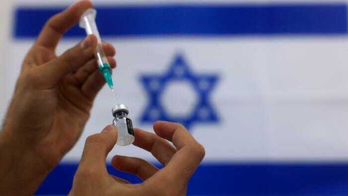 Preparing the Pfizer vaccine for administration 