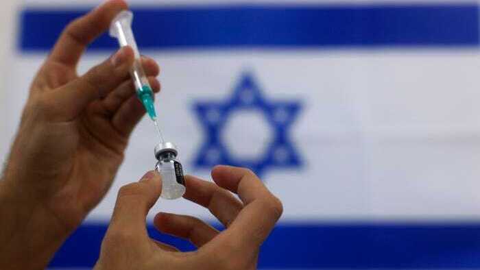 Preparing the Pfizer vaccine for administration 
