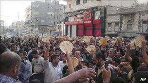 Syrians protest the Assad Regime in Daraa in 2011 