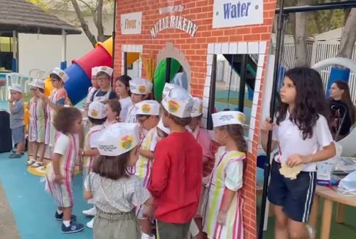 Jewish children in Dubai make matzah for Passover 