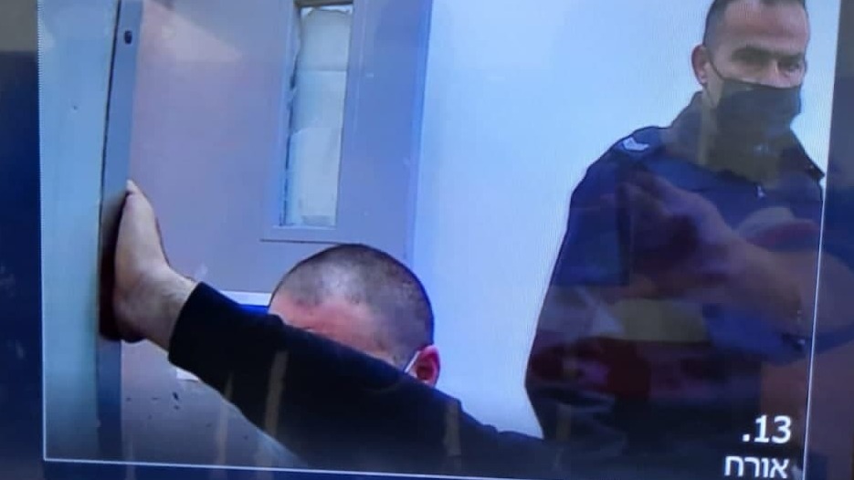 A man suspected of participating in gang rape of mentally disabled teen in court on Monday (Photo: Avihu Shapira) אחד החשודים