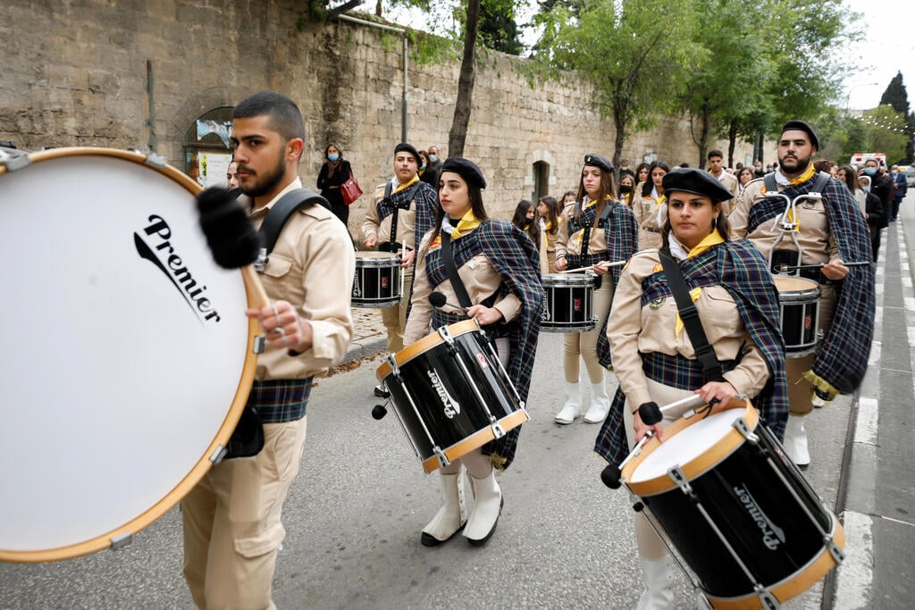Scouts take part in a Christian procession on the eve of the Feast of the Annunciation in Nazareth, northern Israel 