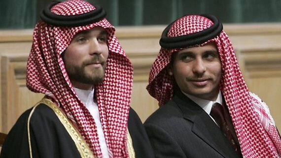 Prince Hamzah Bin Al-Hussein, right, and Prince Hashem Bin Al-Hussein, left, half brothers of King Abdullah II of Jordan, attend the opening of the parliament in Amman, Jordan 