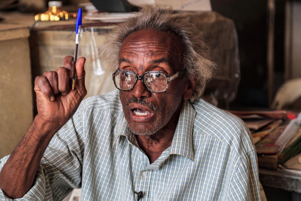 Dr. Mansour Israil, the grandson of an Iraqi Jew who settled in Sudan and whose family later converted to Islam, at his pharmacy in the Omdurman neighbourhood once known as 'the Jewish quarter' 