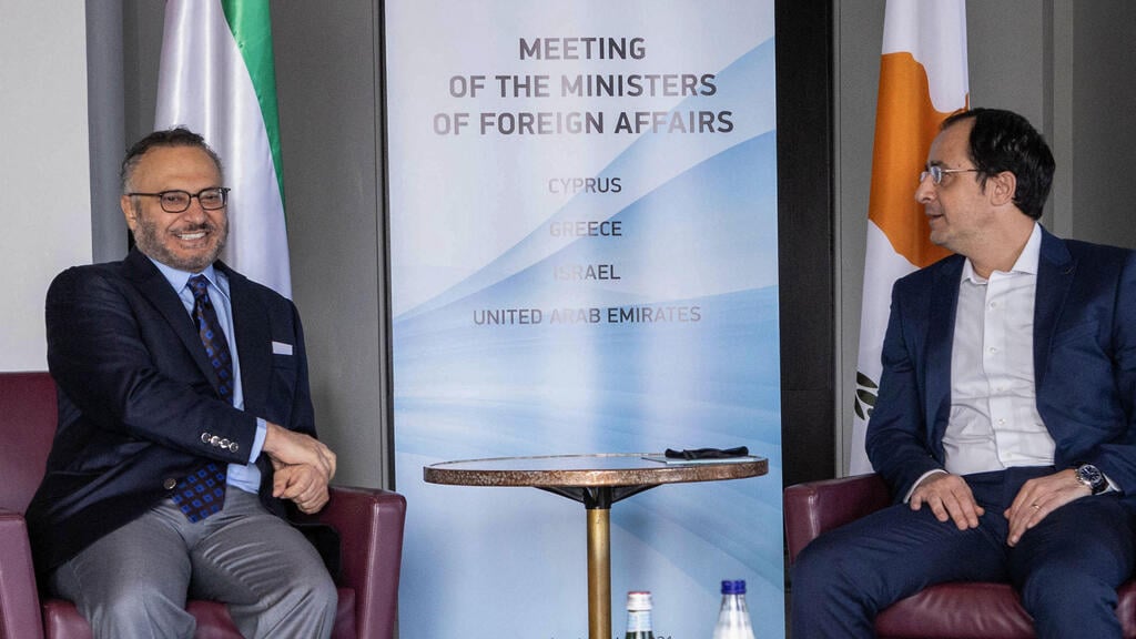 Cyprus Foreign Minister Nikos Christodoulides and Diplomatic Adviser of the President of the UAE Anwar Gargash, in the Cyprioton Friday (Photo: AFP) Cyprus Foreign Minister Nikos Christodoulides and Diplomatic Adviser of the President of the UAE Anwar Gargash, in the Cyprioton Friday